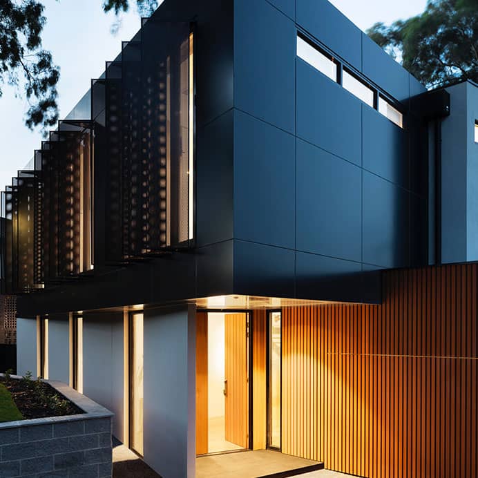 Outdoor entertainment area with paving and pergola
